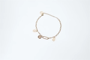 Golden titanium bracelet with smiley face charms and engraved Made For You oval tag