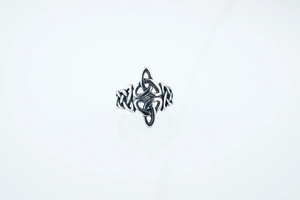 Detailed view of the vintage Celtic Triquetra knot engraving on a stainless steel ring