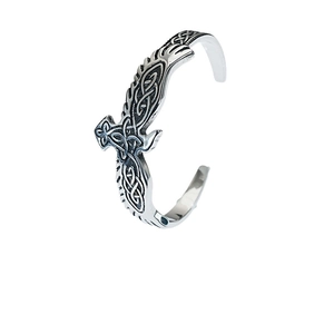 Bracciale rigido vichingo in acciaio inossidabile con nodo celtico e testa d'aquila