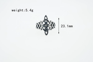 Detailed macro shot of vintage Celtic Knot ring with measurements 5.4g weight and 23.1mm height