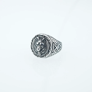 Vintage stainless steel ring featuring a wolf head relief and Nordic runes design