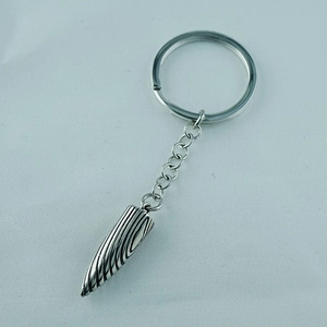 Men luxury bullet shaped titanium steel keychain with vintage silver textured finish