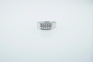 Macro detail of vintage silver abacus ring featuring rotatable beads and textured finish