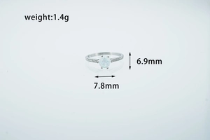 Macro detail of opal ring showing 7.8mm stone width and 1.4g weight specifications