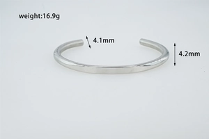Detail view of a 16.9g polished C-shape stainless steel cuff bangle showing 4.2mm thickness