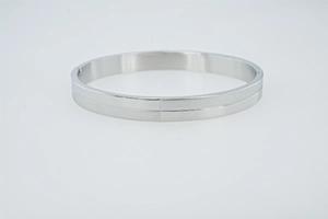 Detail view of 8mm silver stainless steel bangle with polished finish and side hinge