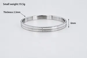 Detail of 6mm wide stainless steel cuff bracelet showing 2.3mm thickness and 19.5g weight