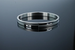 Macro view of 8mm stainless steel bracelet with half-polished and half-brushed texture