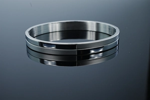 Detail of 8mm stainless steel bracelet showing half-mirror and half-brushed matte finish