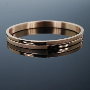 Polished rose gold 8mm stainless steel bangle with a matte frosted and mirror finish