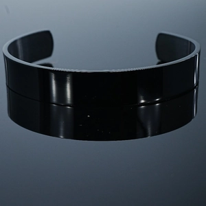 Minimalist black stainless steel open cuff bracelet with a polished mirror finish surface
