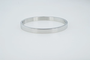 Bracelet jonc en acier inoxydable argenté poli avec design minimaliste et fermoir charnière