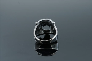 Macro detail of silver tiger ring back with hollow inner band and vintage brushed metal