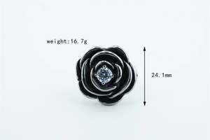 Detail of black rose ring with cubic zirconia inlay showing 24.1mm diameter and 16.7g weight