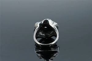 Detailed back view of silver stainless steel ring with hollow structure and polished finish