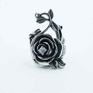 Vintage stainless steel rose ring featuring a centered zircon with an antique silver finish