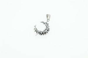Detailed view of silver stainless steel crescent moon pendant with punk thorn edges