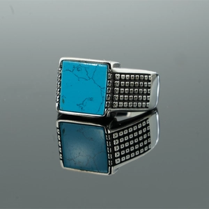 Punk vintage stainless steel ring with square turquoise stone and grid texture details