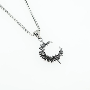 Gothic style moon pendant necklace in silver stainless steel with thorn texture