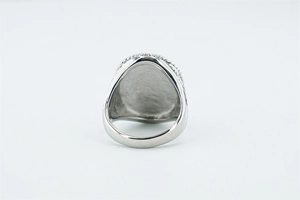Detailed back view of a polished stainless steel ring showing the solid structure and finish