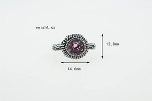 Macro detail of retro engraved ring with purple gemstone and product dimensions