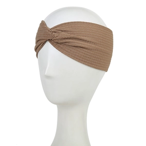 Light brown waffle knit knotted headband for women on a white minimalist head model