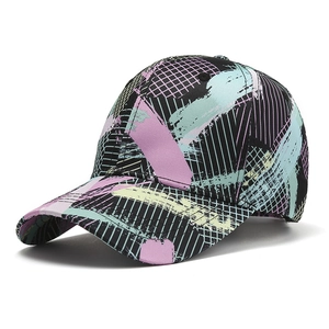 Women's trendy camouflage baseball cap with vibrant paint-brush patterns on black canvas