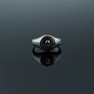 Gothic punk silver skull signet ring made of vintage stainless steel with reflection