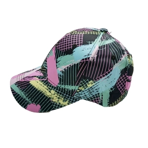 Side view of trendy camouflage baseball cap featuring colorful abstract graffiti patterns