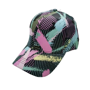 Close-up of pink and blue geometric graffiti pattern on black camouflage baseball cap