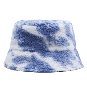 Rainbow tie-dye plush bucket hat for women in blue and white faux fur winter style