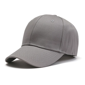 Minimalist grey cotton baseball cap shown from a side view on a clean white background