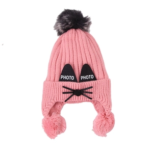 Pink winter knit hat for kids with cat ears and three pom-poms for ear protection