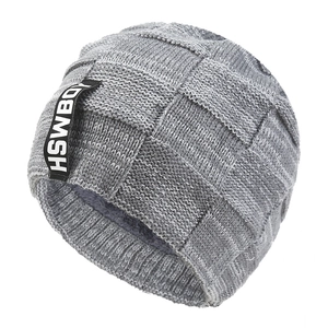 Gray thick knit winter beanie with plush lining and ribbed cuff for extra warmth