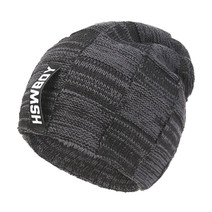 Winter chunky knit beanie for women in dark grey checkered pattern with fleece lining