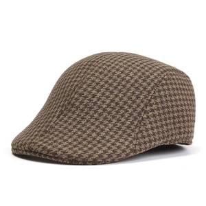 Classic brown herringbone newsboy cap for men featuring a vintage British wool style design