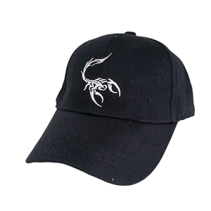 Classic black cotton baseball cap with detailed white scorpion embroidery on front