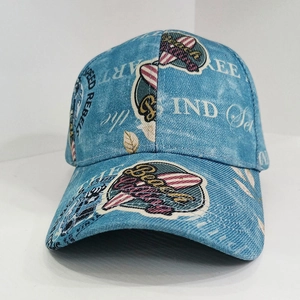 Detailed view of light blue washed denim baseball cap with vintage American rebel prints