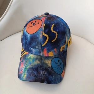 Tie-dye cotton baseball cap with orange graffiti smiley face patterns for outdoor sun protection