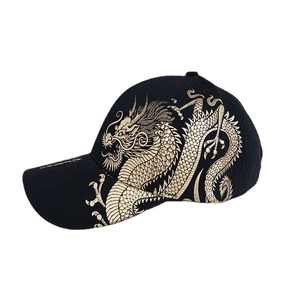 Classic black baseball cap with intricate gold Chinese dragon pattern and street style design
