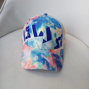 Close-up of cotton tie-dye baseball cap featuring a large blue NEW letter embroidery