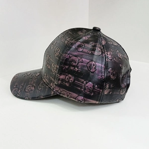 Macro side view of PU leather baseball cap with 3D embossed skull and crossbones texture