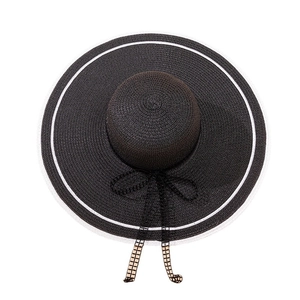 Elegant black wide-brim straw sun hat with white stripes and a black lace bow ribbon