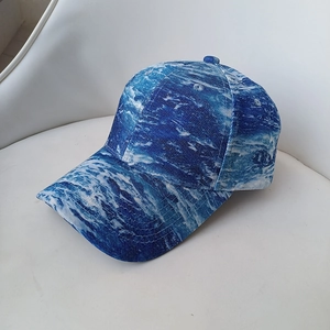 Outdoor fashion baseball cap with blue ocean wave pattern and classic curved brim design