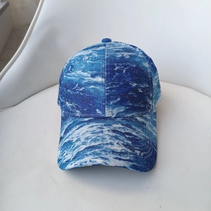 Deep blue wave print baseball cap with six-panel structure and stylish curved brim design