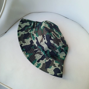 Detail of classic forest camouflage bucket hat with reinforced stitching on the brim