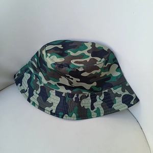 Detailed close-up showing the woodland camouflage print and reinforced stitching on the brim