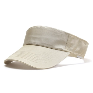 Detail of champagne beige sun visor with satin finish and reinforced brim stitching