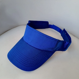 Detail of royal blue sun visor hat featuring a satin finish and reinforced brim stitching