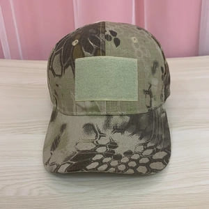 Detail of camouflage baseball cap with front hook and loop patch for DIY custom badges